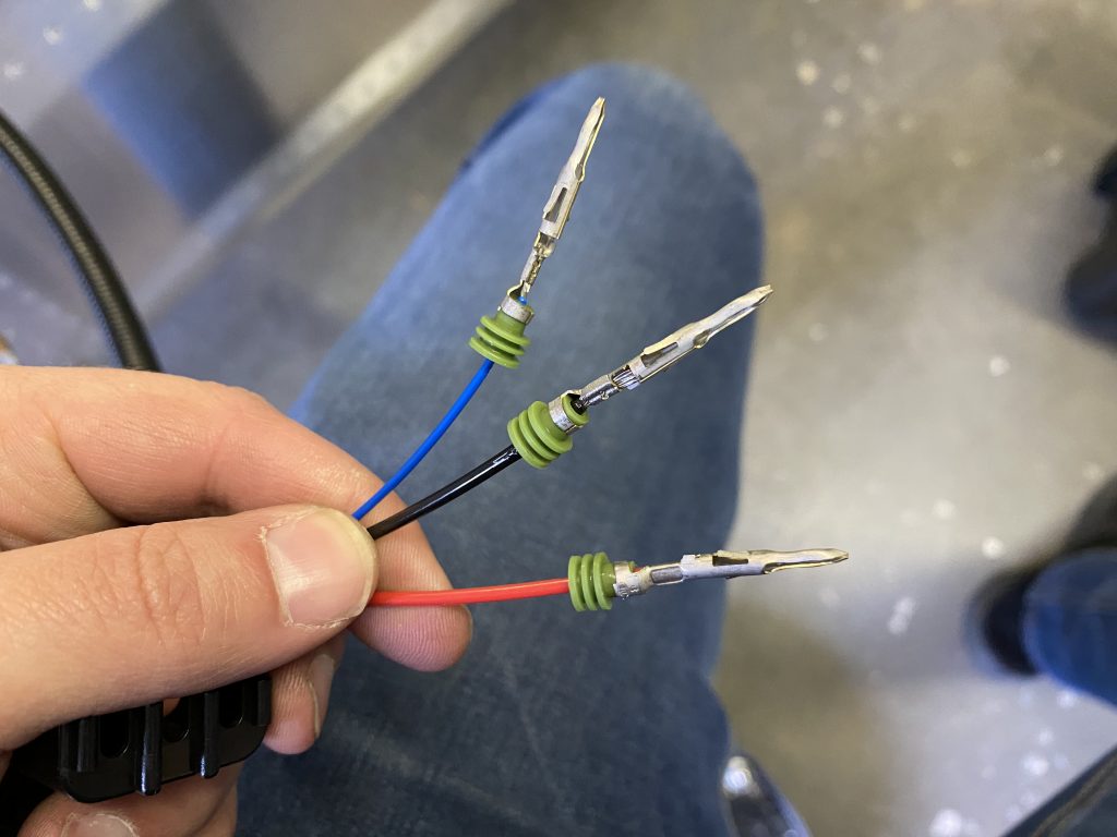 Crimped wires to connect to the regulator (blue connects to the panel to communicate with the G3X to see whether Pitot heat is active)